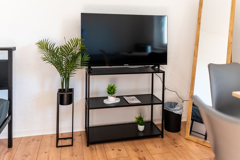 Gemeinsamer Aufenthaltsbereich mit Fernseher